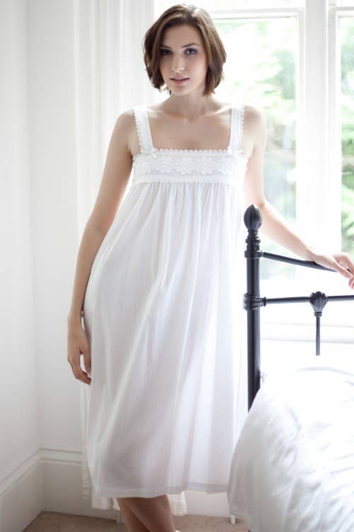 Helen Cotton Lawn Wide Strappy Nightdress in White has elegant floral broderie anglaise lace detail across the sbtle gathered yolk area. It has a gentle smockingeffect on the back for comfort