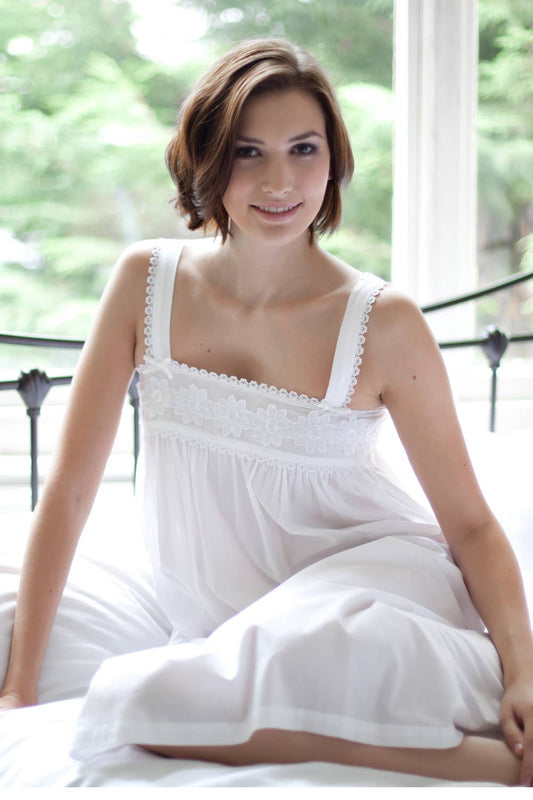 Helen Cotton Lawn Wide Strappy Nightdress in White has elegant floral broderie anglaise lace detail across the sbtle gathered yolk area. It has a gentle smockingeffect on the back for comfort
