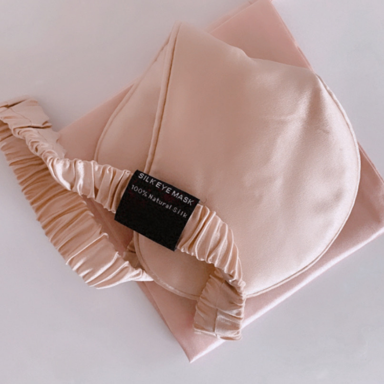 A soft pink 100% mulberry silk eye mask with silk carry case. Soft and luxurious.